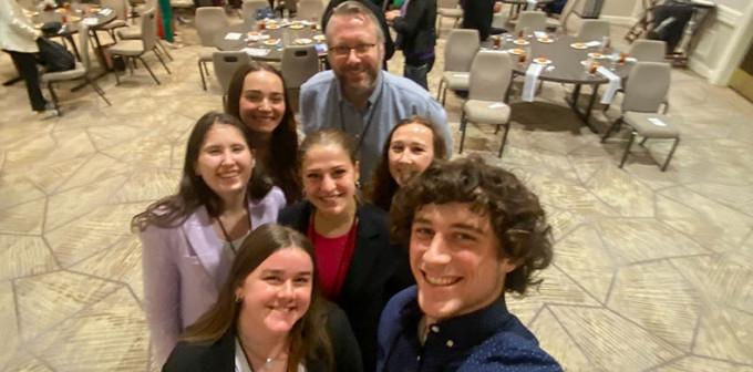 Members of Susquehanna University's chapter of the Association for Women in Sports Media at the organization's annual conference in Charl...